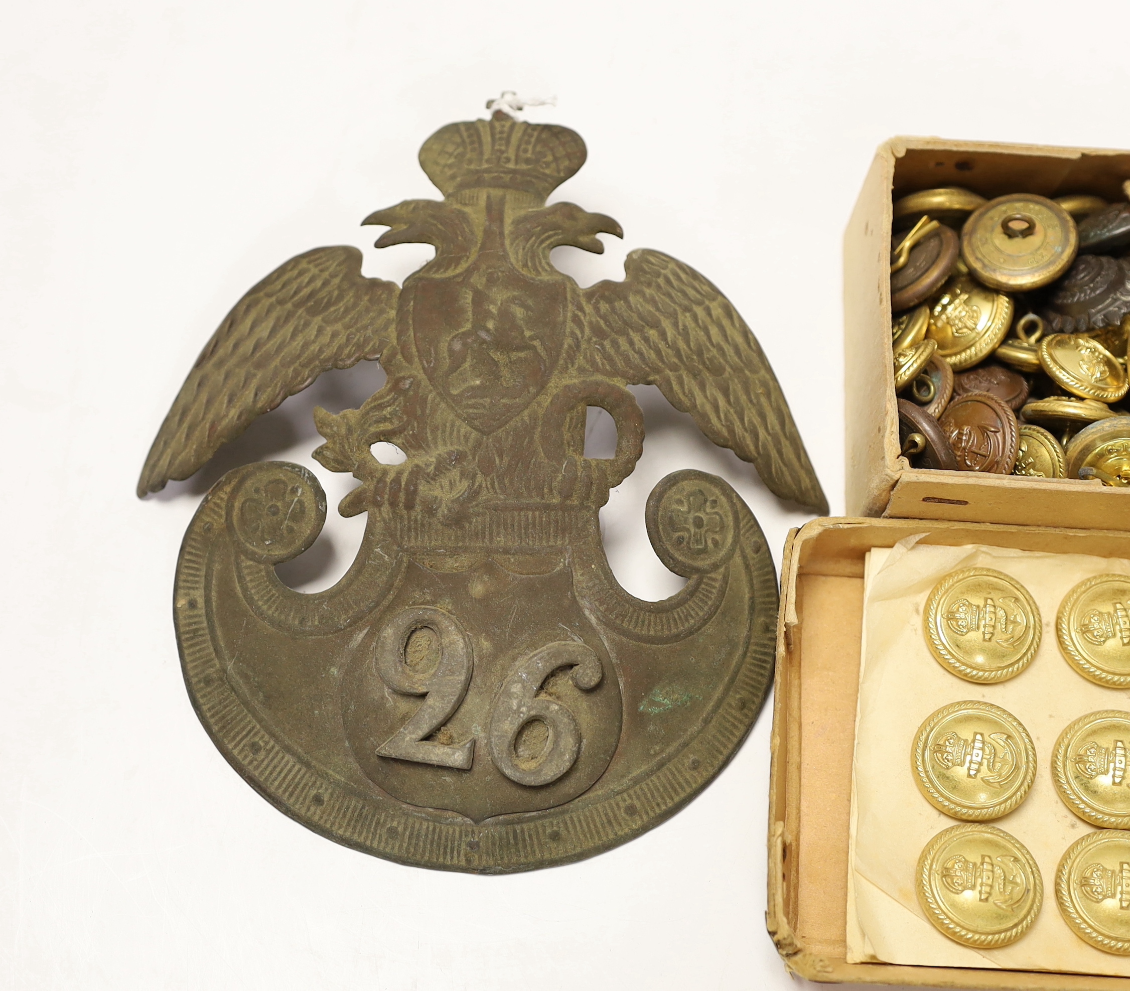 A 19th century Russian style Shako plate and a collection of naval buttons